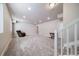 Large finished basement offers ample space for recreation or Gathering activities; includes a stairwell at 195 Silver Rock Trl, Castle Rock, CO 80104