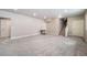 Spacious basement with neutral carpeting and recessed lighting, offering a blank canvas for customization at 195 Silver Rock Trl, Castle Rock, CO 80104