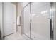 Bathroom with a glass-enclosed shower featuring clean white tile work at 195 Silver Rock Trl, Castle Rock, CO 80104