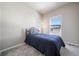 Bright bedroom featuring neutral colors, a large window for plenty of natural light at 195 Silver Rock Trl, Castle Rock, CO 80104