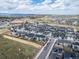 Aerial view of a new residential neighborhood with modern homes and well-planned streets at 195 Silver Rock Trl, Castle Rock, CO 80104