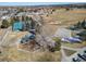 Aerial view of the community park featuring a playground, tennis court, basketball court, and baseball field at 195 Silver Rock Trl, Castle Rock, CO 80104