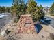 Stone monument marking the entrance to the swim club at 195 Silver Rock Trl, Castle Rock, CO 80104