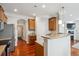 Well-equipped kitchen with granite counters, stainless steel appliances, and hardwood flooring at 10134 Bluffmont Ln, Lone Tree, CO 80124