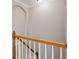 Staircase with neutral wall color with white trim at 10134 Bluffmont Ln, Lone Tree, CO 80124