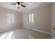 Serene bedroom featuring tiled floors and filled with plenty of natural light at 2317 Elmira St, Aurora, CO 80010