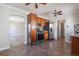A well-equipped kitchen featuring modern appliances and wooden cabinetry at 2317 Elmira St, Aurora, CO 80010