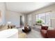 Cozy living room with bright natural light and comfortable seating arrangement at 2317 Elmira St, Aurora, CO 80010