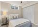Simple bedroom with neutral walls, carpet, a full-sized bed, and a closet at 30313 Arena Dr, Evergreen, CO 80439