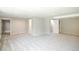 Versatile basement space offers neutral walls, carpet flooring, and ample storage, ideal for creating a personalized living area at 1288 Gambel Oaks Dr, Elizabeth, CO 80107