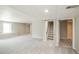 Spacious finished basement with neutral carpet, offering versatile living or storage space at 1288 Gambel Oaks Dr, Elizabeth, CO 80107