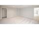Spacious basement boasting neutral tones, plush carpet flooring, and ample storage space for organized living at 1288 Gambel Oaks Dr, Elizabeth, CO 80107