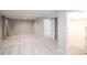 Bright basement featuring neutral walls, carpet flooring, and a convenient closet for organized and comfortable living at 1288 Gambel Oaks Dr, Elizabeth, CO 80107
