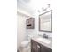 Charming bathroom features a modern vanity, granite countertops, stylish fixtures, and a well-lit mirror at 1288 Gambel Oaks Dr, Elizabeth, CO 80107