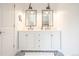 Elegant bathroom with double vanity and modern fixtures, offering a luxurious and functional space at 1288 Gambel Oaks Dr, Elizabeth, CO 80107