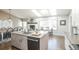 Bright kitchen with a large island, modern appliances, and a cozy breakfast nook at 1288 Gambel Oaks Dr, Elizabeth, CO 80107