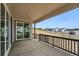 Back porch area with sliding doors overlooking the fenced backyard perfect for outdoor relaxation and entertaining at 1667 Fox Trotter Pt, Castle Rock, CO 80104