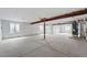 Unfinished basement with concrete floors, exposed beams, and wrapped walls, ready for customization at 1667 Fox Trotter Pt, Castle Rock, CO 80104