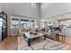 Bright living area with expansive windows offering picturesque neighborhood views at 1667 Fox Trotter Pt, Castle Rock, CO 80104