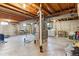 Unfinished basement with exposed ductwork provides ample space for storage or customization at 1395 Abilene Dr, Broomfield, CO 80020