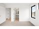 Bedroom featuring an ensuite bathroom, natural light, and neutral paint colors at 2170 Vine Ave, Boulder, CO 80304
