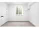 Bright bedroom with large window for natural light and neutral carpet at 2170 Vine Ave, Boulder, CO 80304