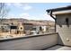View of the surrounding community and distant mountains from the deck of a modern home at 2170 Vine Ave, Boulder, CO 80304