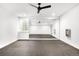 Bright, modern exercise room with mirrored wall, fan, and rubber flooring for a functional workout space at 2170 Vine Ave, Boulder, CO 80304