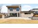 Contemporary home with modern architecture, stone accents, and an expansive patio for outdoor living at 2170 Vine Ave, Boulder, CO 80304