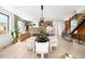 Open concept home with dining area, kitchen, and grand staircase at 2170 Vine Ave, Boulder, CO 80304