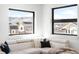 Bright living room with large windows offering great views, comfortable seating, and modern decor at 2170 Vine Ave, Boulder, CO 80304