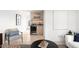Open-concept living room with a wet bar, wine fridge, stylish furniture, and modern decor at 2170 Vine Ave, Boulder, CO 80304