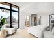 Spacious main bedroom with walkout balcony, large picture windows, and luxury finishes at 2170 Vine Ave, Boulder, CO 80304