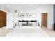 Bright main bedroom featuring crisp white walls and decor with contemporary artwork at 2170 Vine Ave, Boulder, CO 80304