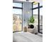Sun-drenched bedroom with expansive windows offering mountain and neighborhood views at 2170 Vine Ave, Boulder, CO 80304
