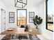 Bright home office with large windows, modern desk, and decor at 2170 Vine Ave, Boulder, CO 80304
