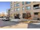 Modern building exterior with street view and bike rack at 1908 W 33Rd Ave # 201, Denver, CO 80211