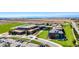 School and athletic fields with surrounding landscapes under blue sky at 329 2Nd St, Frederick, CO 80530