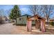 View of a green home with a gazebo and a garden area in the backyard at 329 2Nd St, Frederick, CO 80530