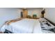 Spacious bedroom with a comfortable bed and decorative wooden furnishings at 329 2Nd St, Frederick, CO 80530