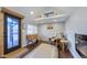 Inviting entryway with a rustic wood accent wall, bench, and light neutral color palette at 329 2Nd St, Frederick, CO 80530