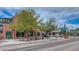 Brick building street view with greenery and benches at 329 2Nd St, Frederick, CO 80530