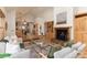 Spacious living room with a cozy fireplace and an open floor plan at 1970 Garland St, Lakewood, CO 80215