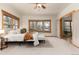 Tranquil bedroom featuring generous natural light, neutral carpeting, and inviting decor for restful nights at 1970 Garland St, Lakewood, CO 80215