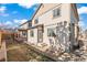 Backyard featuring a small patio and a wooden fence at 21893 E Layton Dr, Aurora, CO 80015