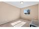 Bedroom featuring neutral carpet, bright lighting, and a window at 21893 E Layton Dr, Aurora, CO 80015