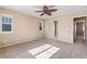 Bedroom with a ceiling fan, neutral walls, carpet and natural light at 21893 E Layton Dr, Aurora, CO 80015