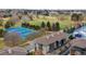 Inviting condo complex with a park, tennis courts, and soccer field at 188 S Locust St, Denver, CO 80224