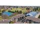 Aerial view of townhomes, nearby tennis courts and park at 188 S Locust St, Denver, CO 80224