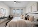 Comfortable bedroom with modern decor, lots of natural light, and plush carpeting at 188 S Locust St, Denver, CO 80224